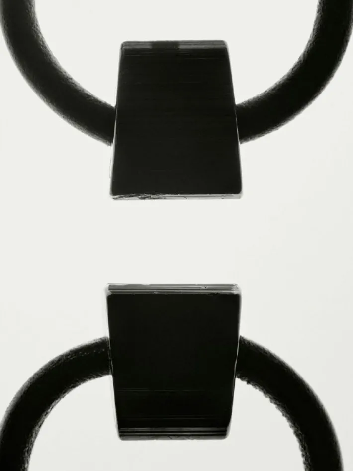 Monies Mint earclips: black tourmaline, leather