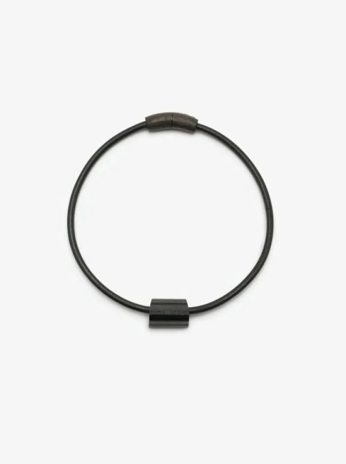 Monies Mint necklace: leather, bog oak, tourmaline